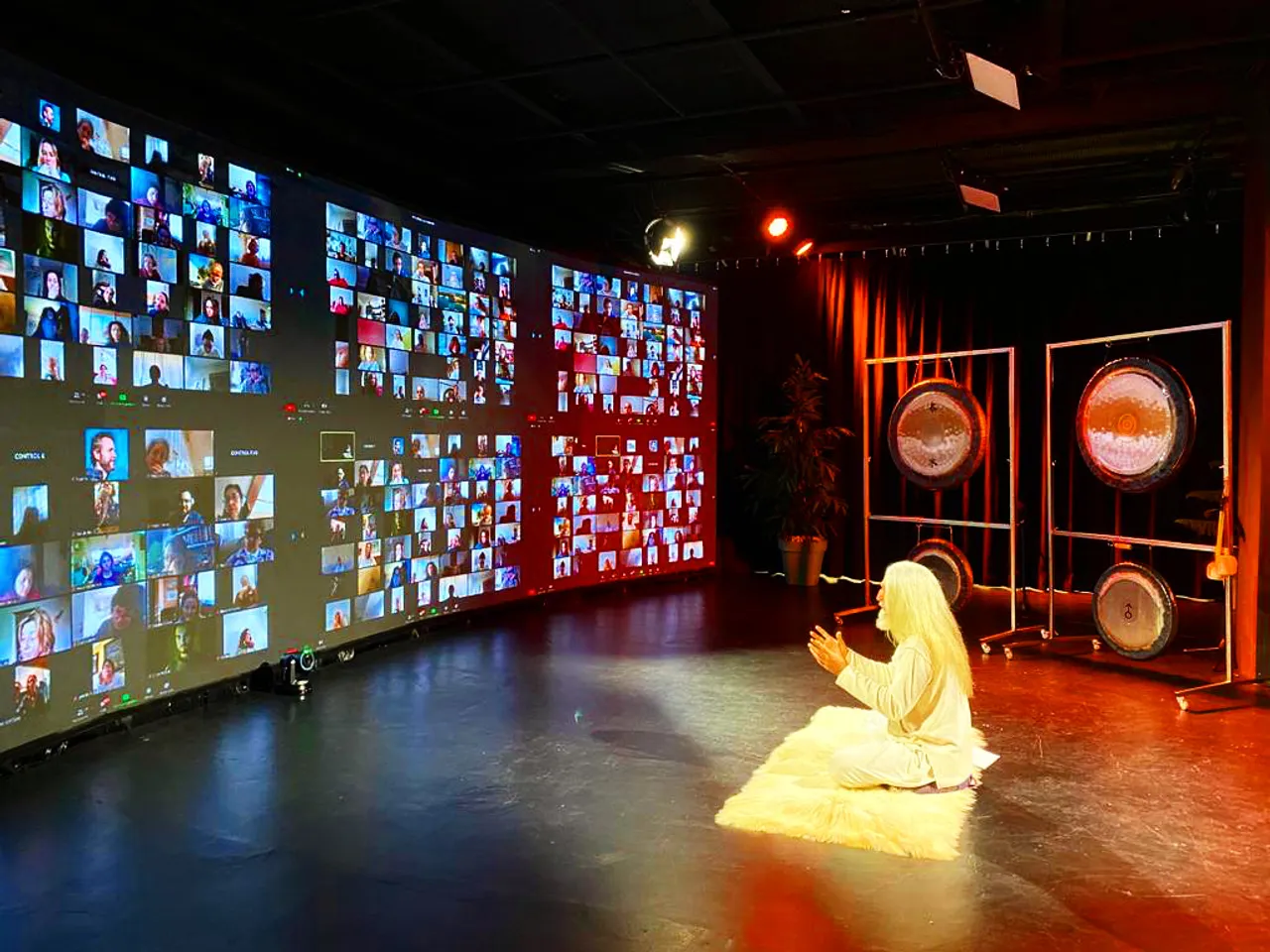 Instructor with virtual audience and gongs